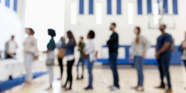 a line of voters at the polls on election day